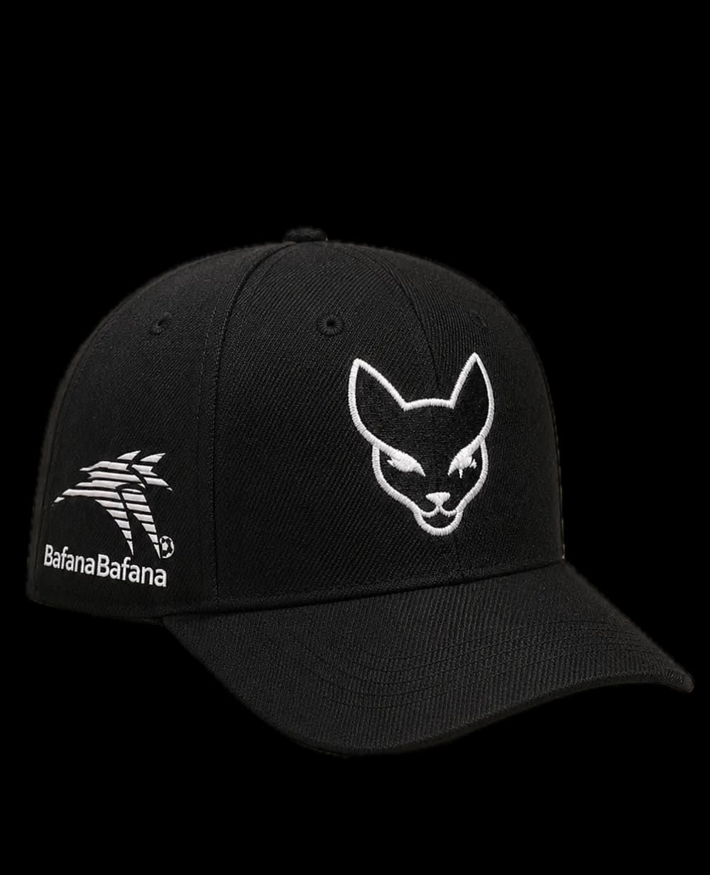 Black Xintu six-panel cap with the cat mark embroidered in white and the Bafana Bafana badge on the left panel